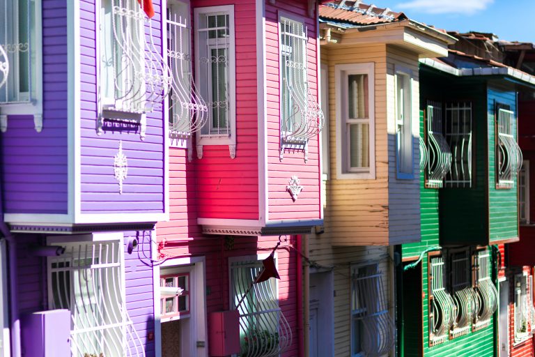 Row Of Colourful Exterior Wood Houses